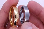 The titanium ring differs from the gold ring
